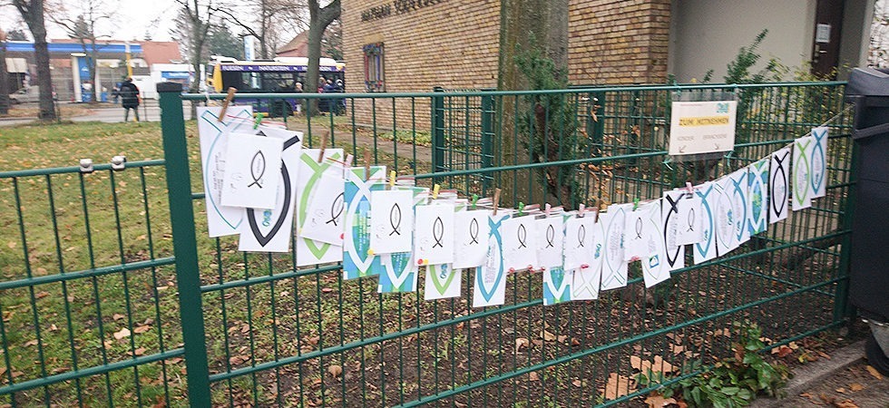 Fische am Zaun